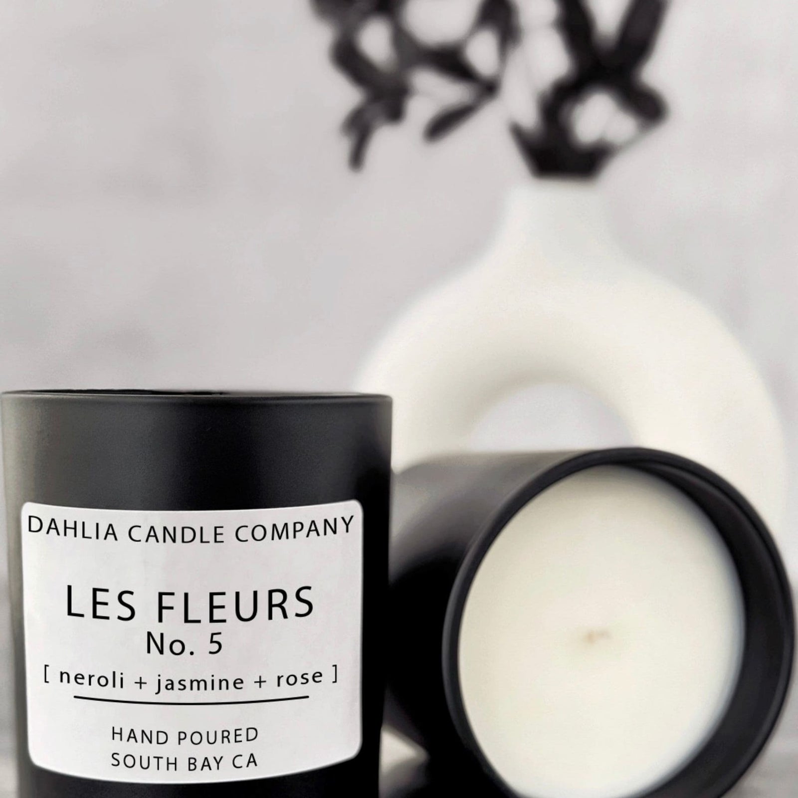 Les Fleurs No. 5 candle, a luxurious floral blend of neroli, jasmine, and rose inspired by classic French perfumery.