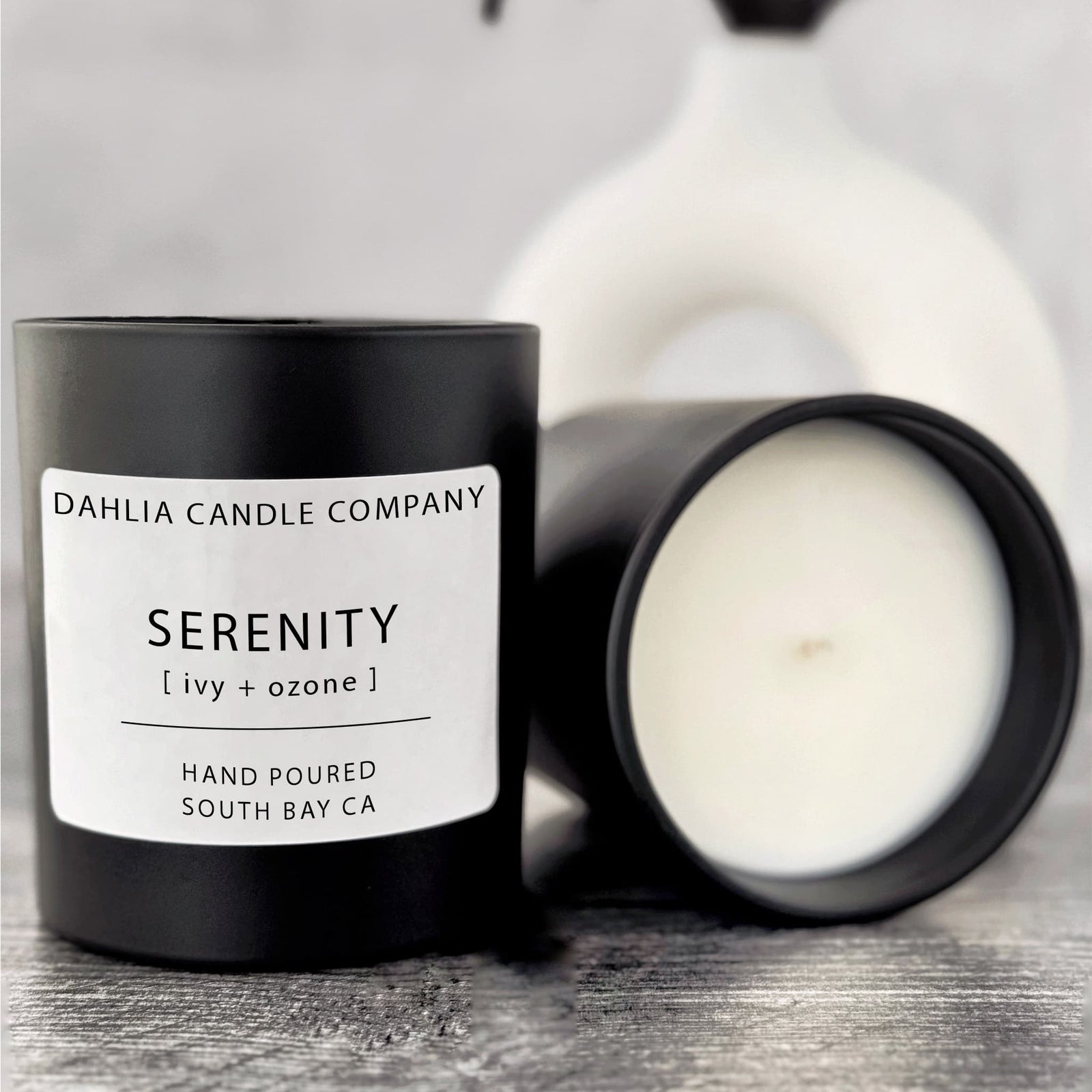 Serenity candle infused with leafy ivy and fresh ozone, capturing the scent of a serene garden after rain.